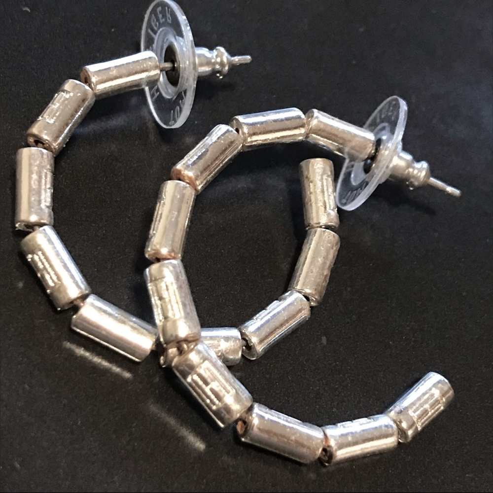 NWOT Tommy Hilfiger Silvertone HuggieHoop Earrings